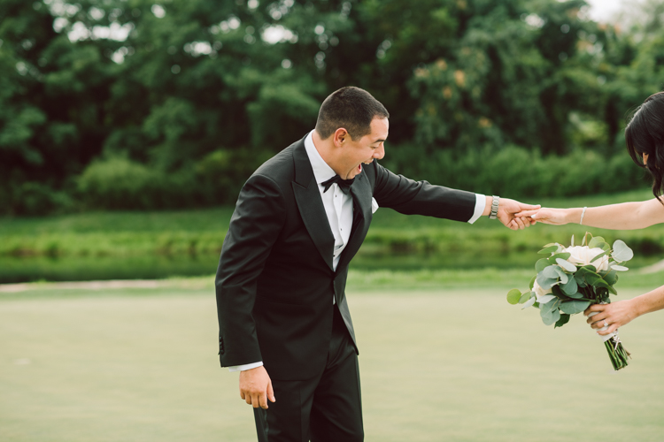 Brianna and Joe perfectly balances each other with their opposite personalities. Brianna quiet and calm and Joe loud and funny, they are the yin and yang to each other and together they create amazing chemistry. Joe's eyes literally sparkles when he is looking at her. Brianna and Joe's summer wedding at Trump National Golf Club Colts Neck NJ this past August was nothing but fun, filled with love and happy tears. Love is all we need in a wedding day! Brianna and Joe got married at ST. Mary’s Church in Colts Neck NJ then partied at Trump National Golf Club Colts Neck NJ. As soon as everyone was inside for the reception, the heavy grey clouds released a down pour washing the humidity away. Leaving cool evening for the newlyweds and their wedding guests to enjoy. Brianna and Joe's wedding at Trump National Golf Club Colts Neck NJ photographed by Karis, NY NJ wedding and elopement photographer Hey Karis.